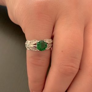 Size 6 sterling silver Emerald color ring.
